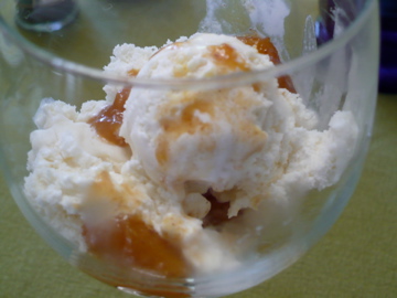 Shikes Haines - vanilla ice cream with peach rum sauce