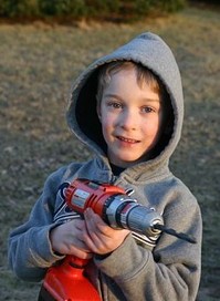 Mayrend-Zach_drilling_hole_Maple_tree.jpg