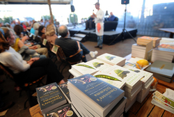 Maxwell - Pollan books in the foreground as Chef Alex speaks