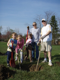 Thumbnail image for A family volunteers together for 2009 Arbor Day Tree Planting at Lawton Park