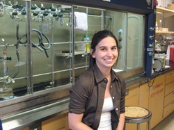 Erica-in-front-of-her-fume-hood.jpg