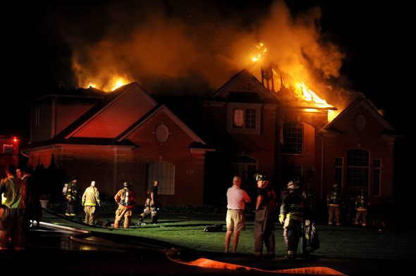 houses on fire pictures. 061810-AJC-house-fire-01a.jpg