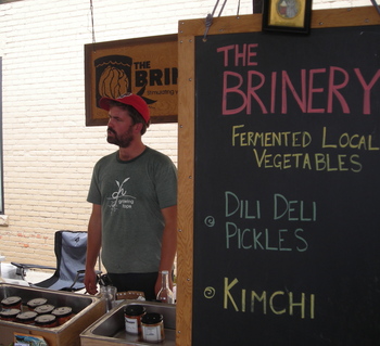 Borden - David K in front of Brinery sign