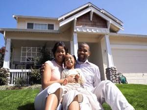 Family in front of home.jpg