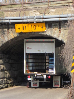 Truck_stuck_under_overpass.jpg