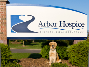 Alpine-posing-Arbor-Hospice-sign-AAAH.jpg