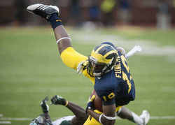 devin-funchess-dive-um-football.jpg