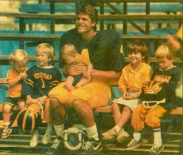 JimHarbaugh_with_children.jpg