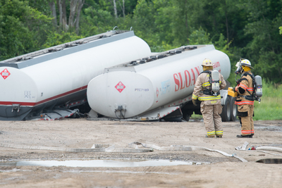 gas spill hazmat gasoline gallons tanker team spilled 1000 judge when ypsilanti township falls collapsed shut officials ask company down