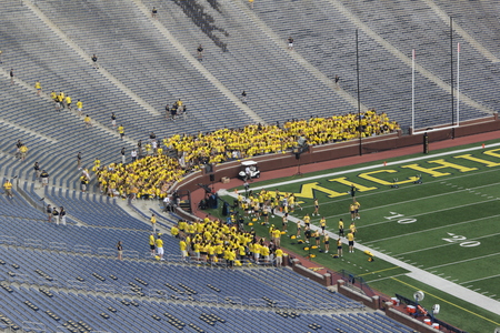 Students_fill_stadium_umich_football.JPG