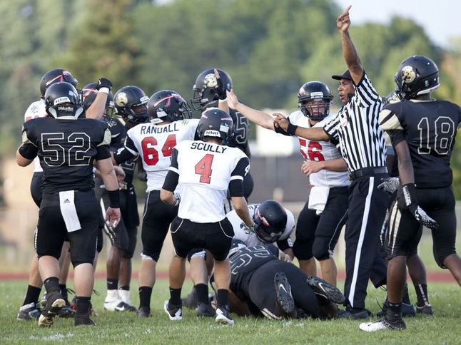 milan-ypslanti-ref-players.jpg