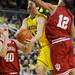 Indiana guard Verdell Jones III, right, and forward Cody Zeller, left, try to block a shot by Michigan guard Zack Novak. Angela J. Cesere | AnnArbor.com
