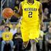 Michigan guard Carlton Brundidge dribbles the ball down the court in the first half. Angela J. Cesere | AnnArbor.com
