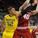 Michigan forward Jordan Morgan reaches to try to grab the rebound from Indiana forward Cody Zeller. Angela J. Cesere | AnnArbor.com

