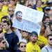A fan holds a sign referencing a line from the movie Anchor Man  during the football game against San Diego State at Michigan Stadium on Sept. 24, 2011. Angela J. Cesere | AnnArbor.com