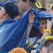 A Michigan fan hides under the edge of a poncho during the game against Western Michigan at Michigan Stadium in Ann Arbor, Mich. on Sept. 3, 2011. Angela J. Cesere | AnnArbor.com