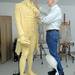 Sculptor Tony Frudakis smoothes out the urethane foam on Thomas Jefferson's chin.  Angela J. Cesere | AnnArbor.com
