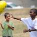 Ann Arbor residents Isaiah Howard, age 6, left, and Christopher Poplar, age 6, play with a balloon during the 18th annual Juneteenth celebration at Wheeler Park. Angela J. Cesere | AnnArbor.com