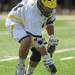 Michigan's Brian Greiner scoops up a loose ball. Angela J. Cesere | AnnArbor.com
