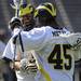 Michigan's Trevor Yealy, left, celebrates with Will Meter after Meter's goal. Angela J. Cesere | AnnArbor.com
