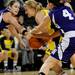 Michigan guard Jenny Ryan tries to keep the ball from the hands of Northwestern forward Dannielle Diamant, left, and forward Kendall Hackney. Angela J. Cesere | AnnArbor.com
