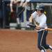 Michigan outfielder Nicole Sappingfield swings at the ball. Angela J. Cesere | AnnArbor.com
