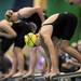 Huron's Annie Tamblyn gets ready on the block before heat 6 of the 50 yard freestyle. AnnArbor.com | Angela J. Cesere