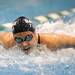 Saline's Emily Lau competes in heat 6 of the 100 yard butterfly. AnnArbor.com | Angela J. Cesere