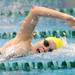Huron's Annie Tamblyn competes in heat 5 of the 100 yard freestyle. AnnArbor.com | Angela J. Cesere
