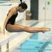 Pioneer diver Christina Lu jumps off the springboard into a dive. AnnArbor.com | Angela J. Cesere