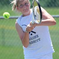 Saline's Heather Vogt hits the ball in the 3 singles match against Pioneer's Diya Malhotra at a tournament at Pioneer High School on Wednesday afternoon. Angela J. Cesere | AnnArbor.com
