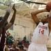 River Rouge's James Walker, left, tries to block a shot by Willow Run's Aaron Belin. Angela J. Cesere | AnnArbor.com
