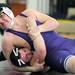Pioneer's Steven Keeler, right, tries to pin Belleville's Devin Kelemen during the 285 lb weight class match. Angela J. Cesere