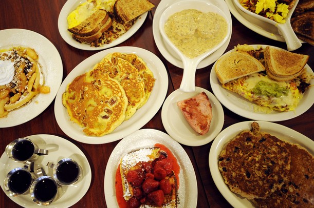 Taking A Bite Out Of Ann Arbor S Best Breakfast Joints Angelo S Server Rosey Hurd Carries Two Plates Of Toast To A Table At The Restaurant On Tuesday March 12 2017 Melanie Maxwell I Annarbor
