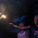 8-year-old Lilli Howe plays with a sparkler before Manchester's annual fireworks show at Carr Park, July 3.
Courtney Sacco I AnnArbor.com 