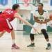 Huron's Brian Walker looks for an opening against Beford's Jackson Lamb during the first half of their game Thursday evening at Huron High School.
Courtney Sacco I AnnArbor.com 