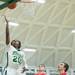 Huron's Demetrius Sims jumps to make a shot against Beford during first half of their game Thursday evening at Huron High School.
Courtney Sacco I AnnArbor.com 