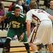 Huron's Brian Walker looks for an opening against Dexter's Adam Sikorski during the second half of the Class A district semifinals at Skyline High School Wednesday Mar. 6th.
Courtney Sacco I AnnArbor.com   