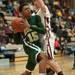 Huron's David Wren drives the ball to the basket against Dexter during the second half of the Class A district semifinals at Skyline High School Wednesday Mar. 6th.
Courtney Sacco I AnnArbor.com   