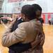 Milan's C.J. Turnage hugs his father Calvin Turnage Sr. after wining the district finals over Temperance Bedford 67-50.

Courtney Sacco I AnnArbor.com 