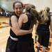 Dexter's Teia McGahey hugs her team mate Morgan Van Hoof after winning the state quarterfinals against Heritage at Davison High School Tuesday, Mar. 13th.
Courtney Sacco I AnnArbor.com  