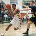 Ypsilanti's Justin Bernard  drives the ball to the basket during the third quarter of the Class A regional finales at Huron High School Wednesday, Mar.13th.
Courtney Sacco I AnnArbor.com 