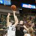 Dexter's Emma Kill and Grosse Pointe South's Claire DeBoer jump as they tire to make a rebound during the second quarter of Class A girls state semi-finals healed at the Breslin Center in East Lansing Friday Mar. 15th.
Courtney Sacco I AnnArbor.com  