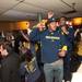 Wolverines fans celebrate inside Good Time Charley's on South University Avenue on Saturday night after their team defeated Syracuse in the Final Four game. Courtney Sacco I AnnAror.com 