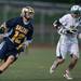 Saline's Ton Needham runs the ball up the field during their game against Huron Wednesday, May 8.
Courtney Sacco I AnnArbor.com  