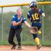 Saline's Kaylee harmon safe at fist during their double header against Lincoln, Thursday May 8.
Courtney Sacco I AnnArbor.com