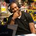Former Wolverines football player Charles Woodson laughs during the Mott Takeover telethon on WTKA at the MDen Friday May 17.
Courtney Sacco I AnnArbor.com