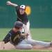 Milan's Thomas Lindeman tags out  Riverview's runner at second base, during their game at Airport High School in Carleton, Saturday, June 8.
Courtney Sacco I AnnArbor.com