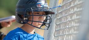 Alex Kim watches the game as he waits for his turn up to bat.
Courtney Sacco I AnnArbor.com 