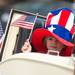 A child waves an American flag as he takes part in Ypsilanti's 4th of July parade.
Courtney Sacco I AnnArbor.com 
